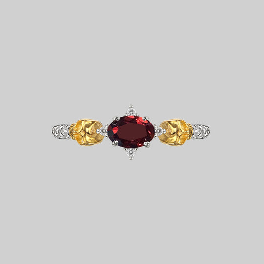 POISON. Garnet & Skulls Ring - Silver
