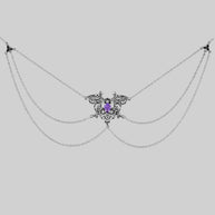 Silver detailed skull and amethyst necklace