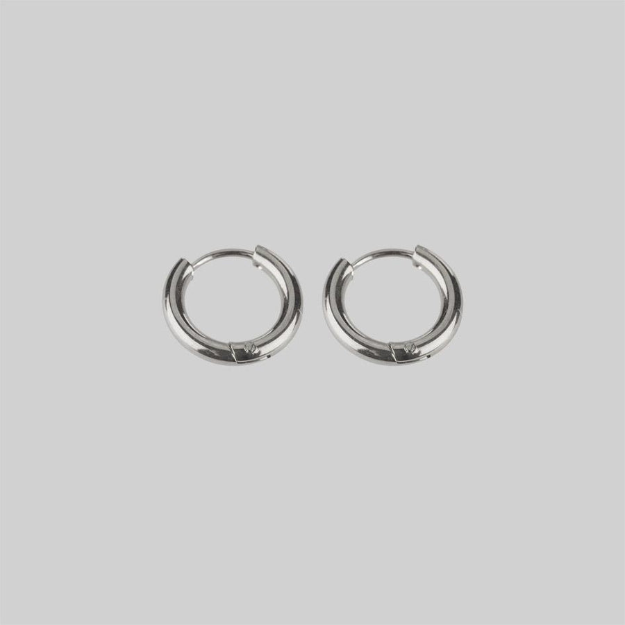 VITA. Hinge Huggie Hoop Earrings - Silver Mini silver hoop earrings