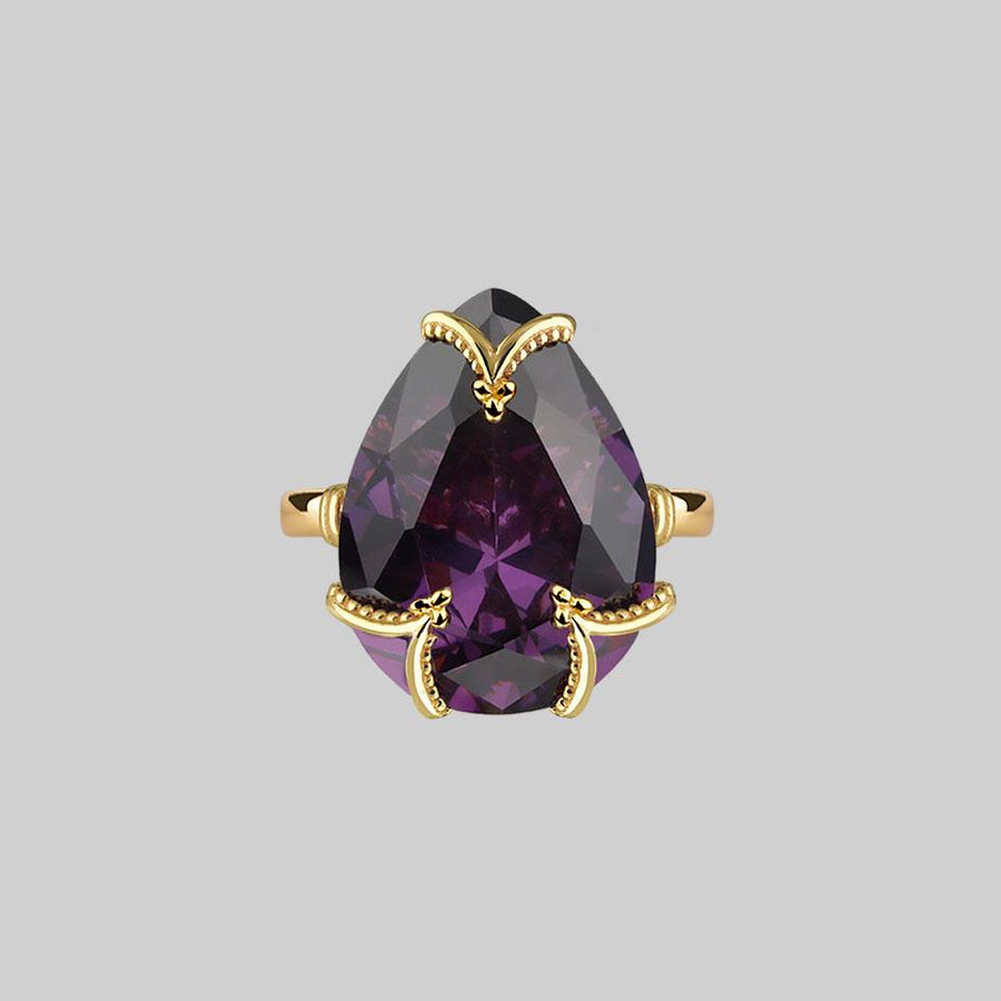 large purple gemstone ring