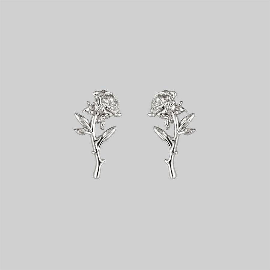 silver rose stud earrings pair