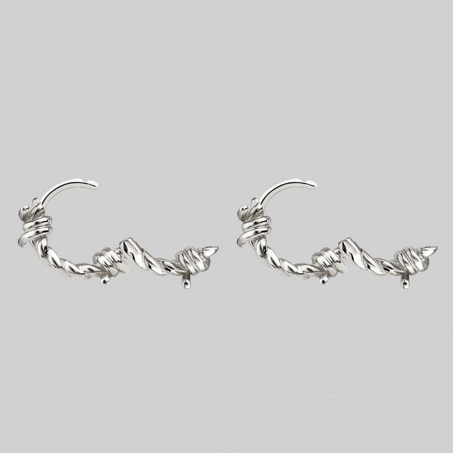 SURVIVAL. Symbolic Barbed Wire Clicker Hoop Earrings - Silver barbed wire hoop earrings sterling silver