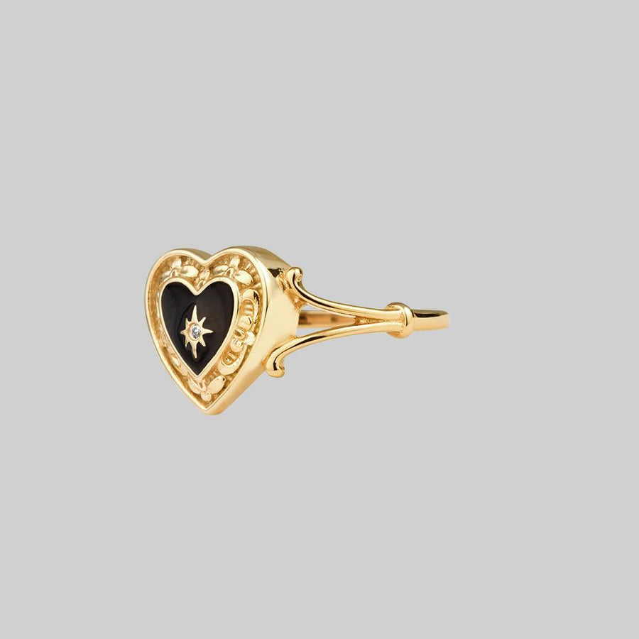 SOLEMN. Black Enamel Heart Ring - Gold detailed black heart ring