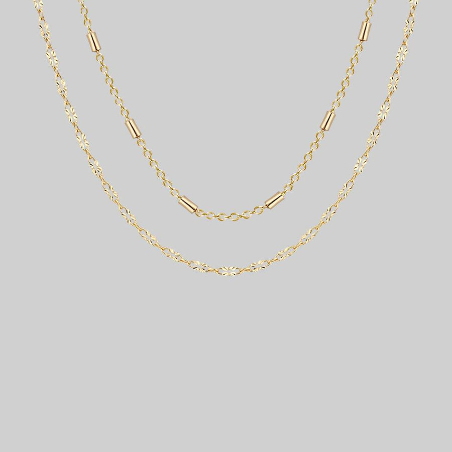 delicate gold layering necklaces