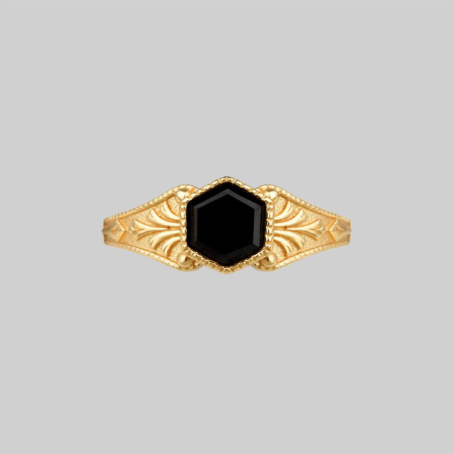 ornate black hexagon ring gold