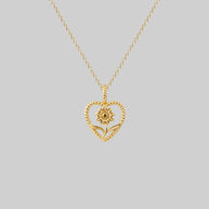 gold heart and flower necklace