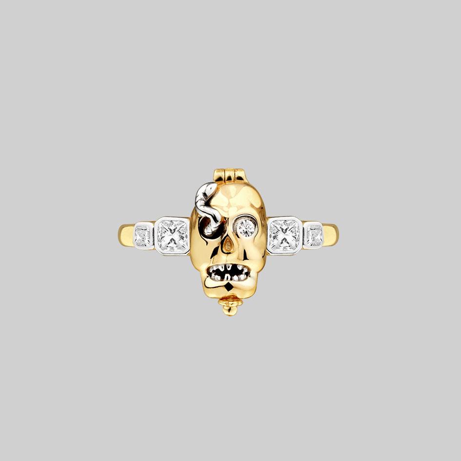 gold skull and snake gemstone ring
