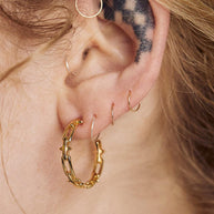 gold spike hoop earrings
