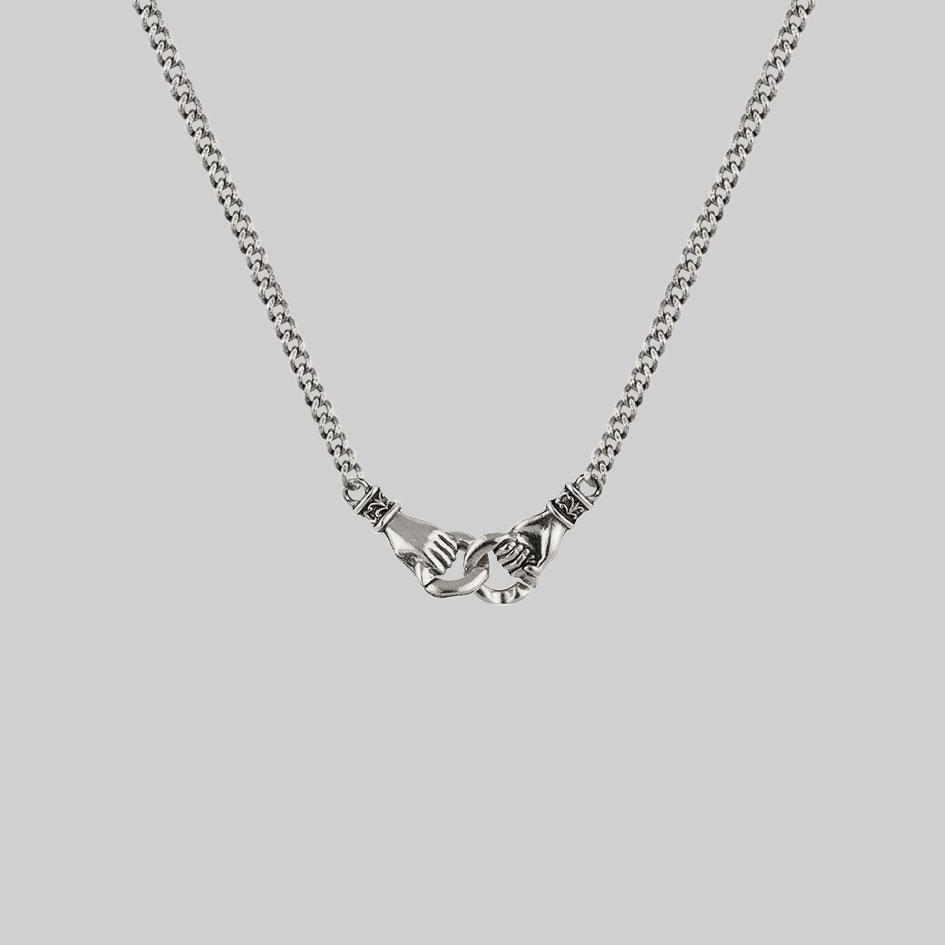 silver necklace, holding hands necklace