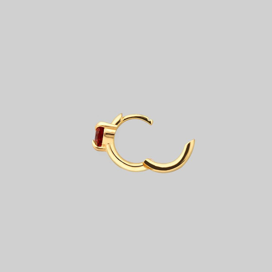 HEART & SOUL. Garnet Heart Hoop Earrings - Gold single heart hoop earring