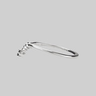 silver chevron ring with black gemstone