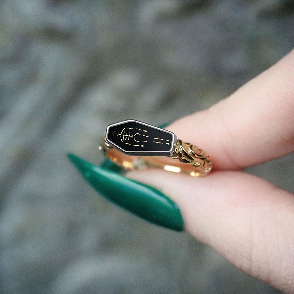 gold coffin skeleton ring