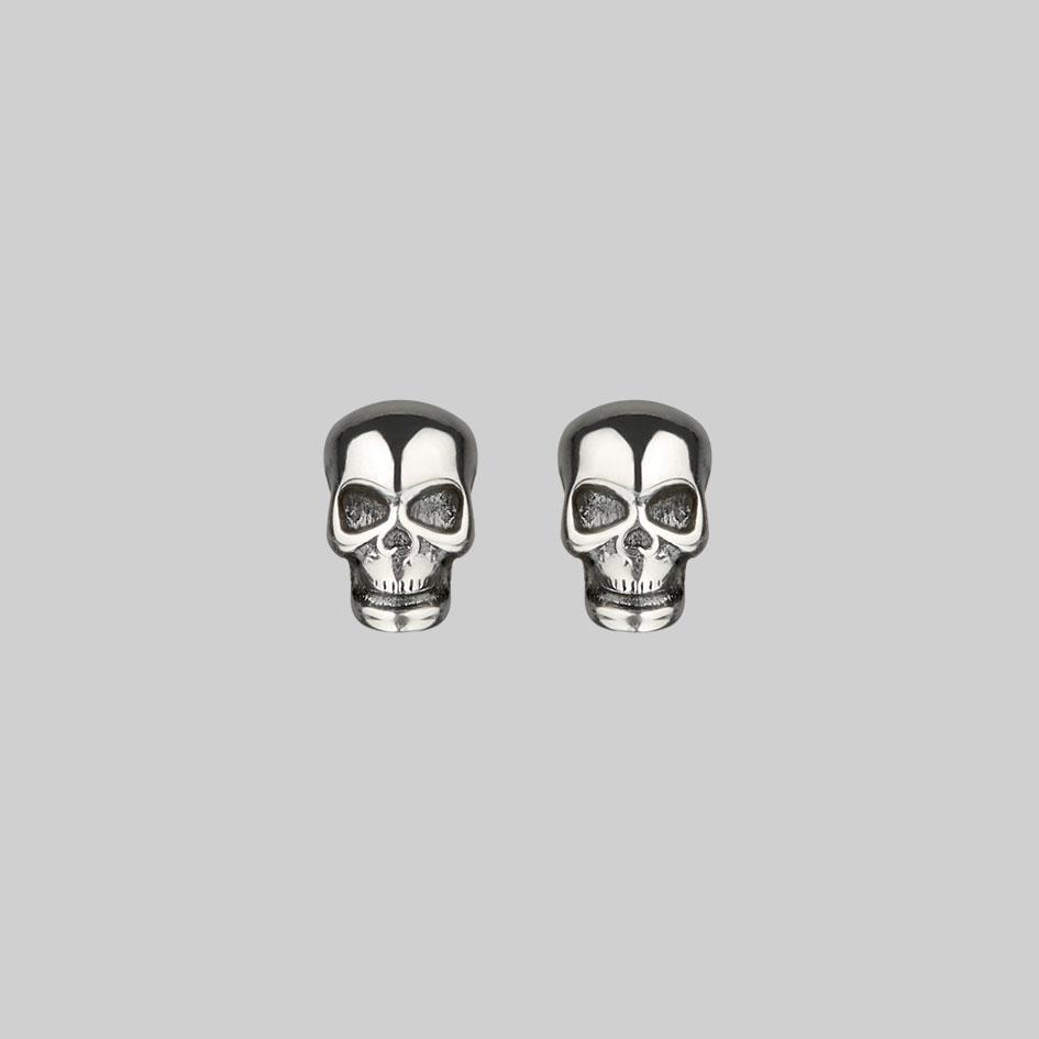 sterling silver skull stud earrings