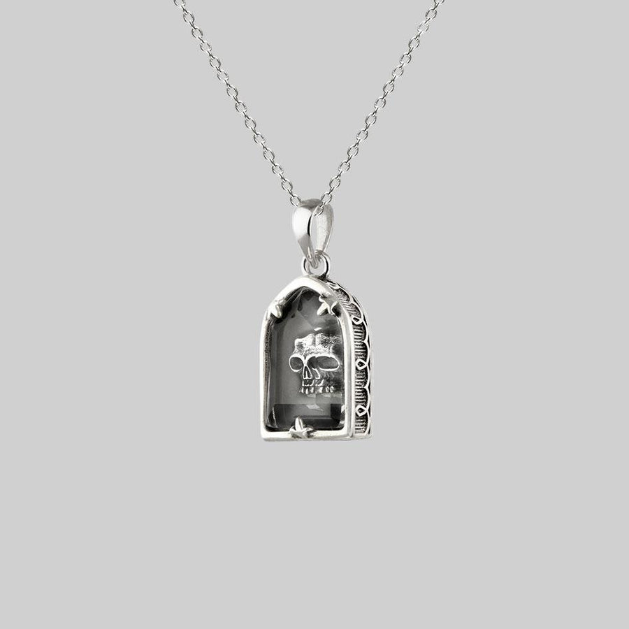 OMINOUS. Skull Under Glass Necklace - Silver glass skull pendant necklace