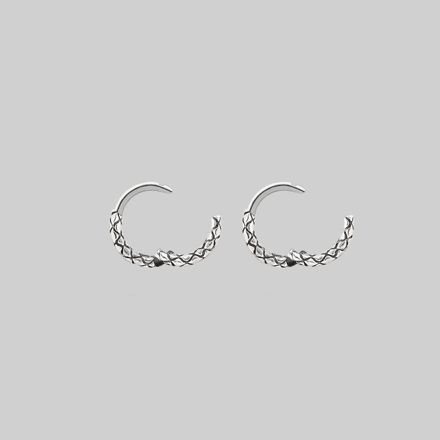 VEGA. Snake Skin Clicker Hoop Earrings - Silver snake skin detailed clicker hoops