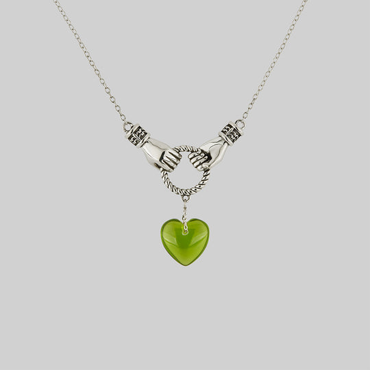 UNITE. Hand Grasping Green Glass Heart Necklace - Silver