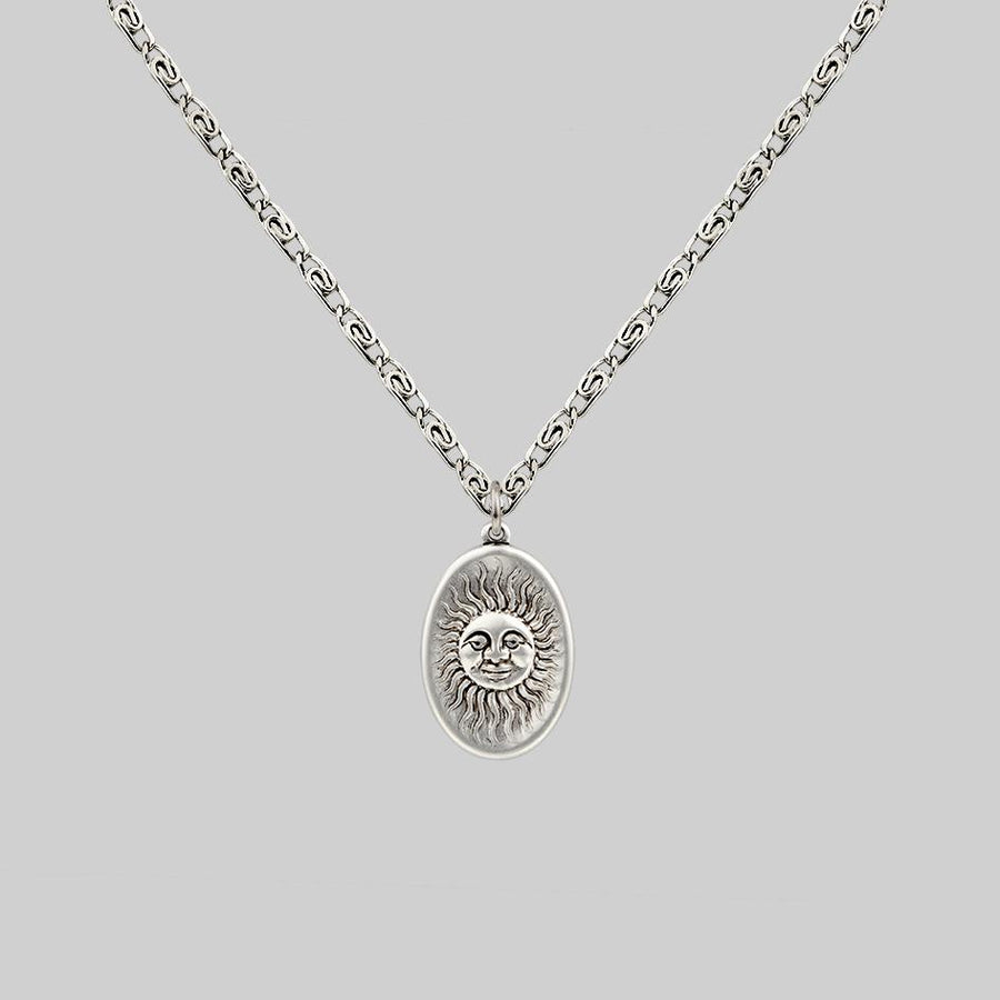 DAWN. Symbolic Sun Face Necklace - Silver detailed sun face silver necklace