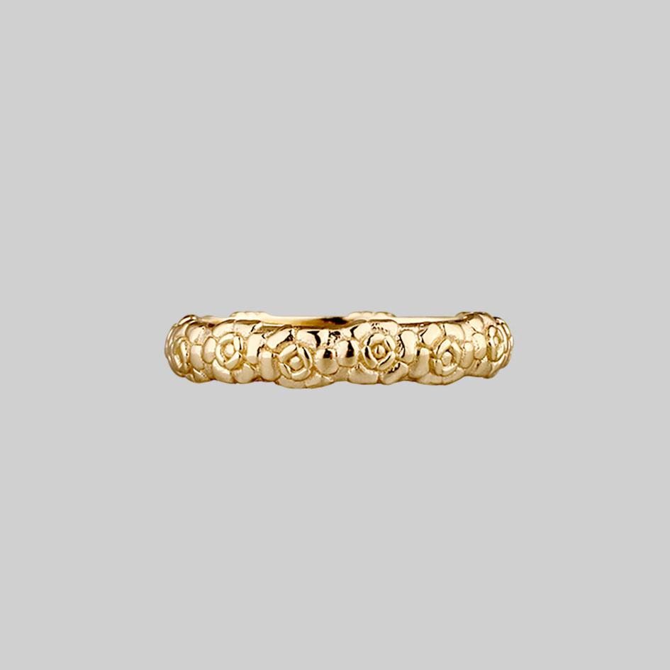 Floral gold posey ring with words inside