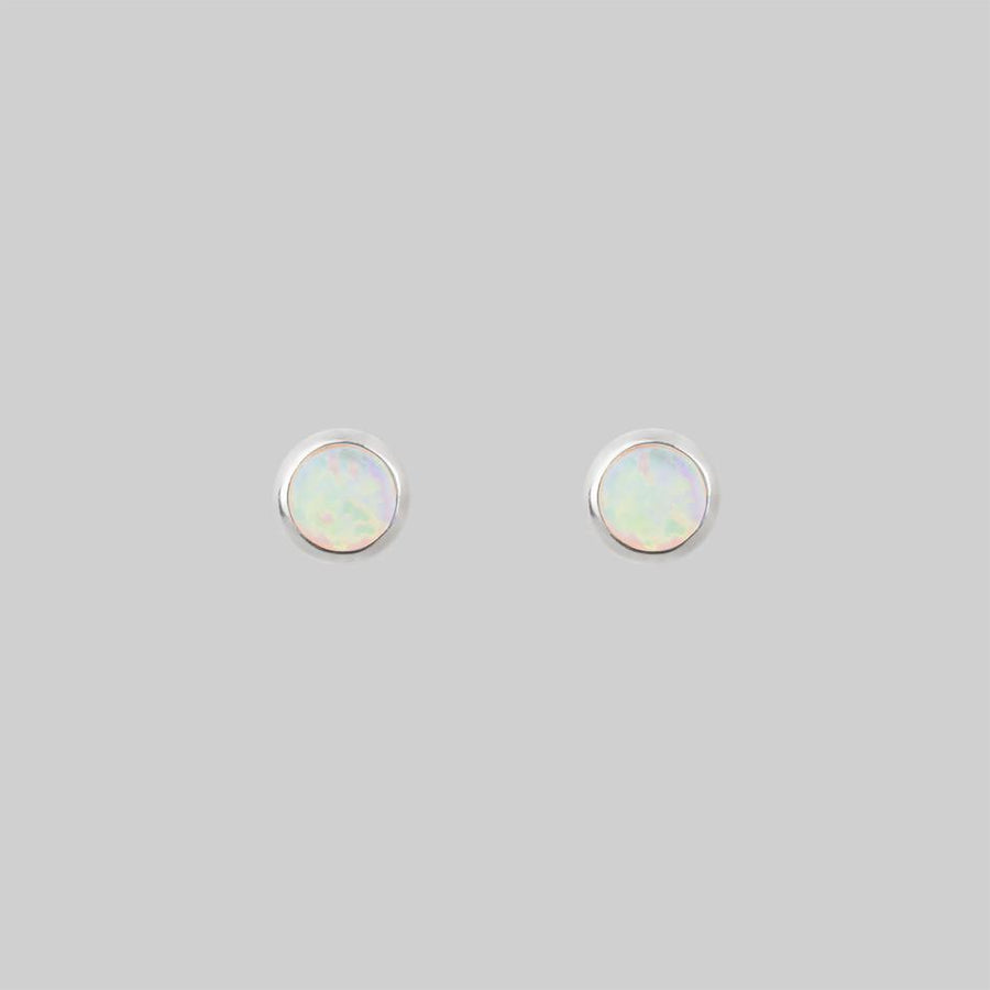 Tiny opal stud earrings