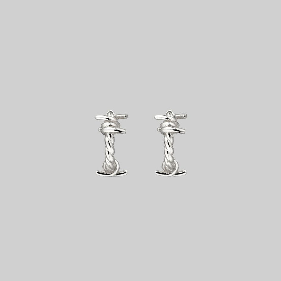 SURVIVAL. Symbolic Barbed Wire Clicker Hoop Earrings - Silver silver twisted barbed wire hoops