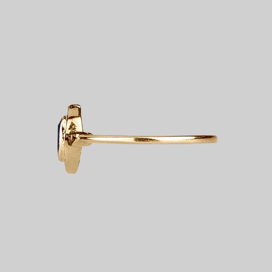 gold ring with blue quartz gemstone