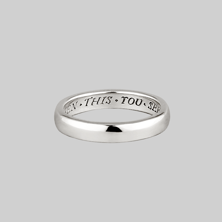 silver band posey ring with words inside