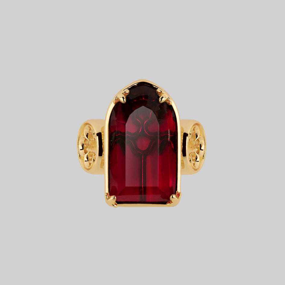 gothic cathedral window red glass ring gold arch 