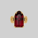 gothic cathedral window red glass ring gold arch 
