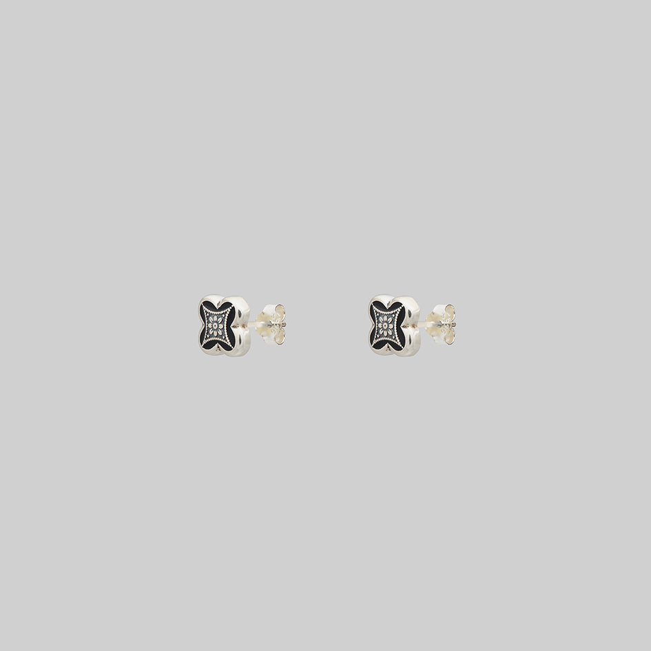 pair of silver tudor gothic style stud earrings