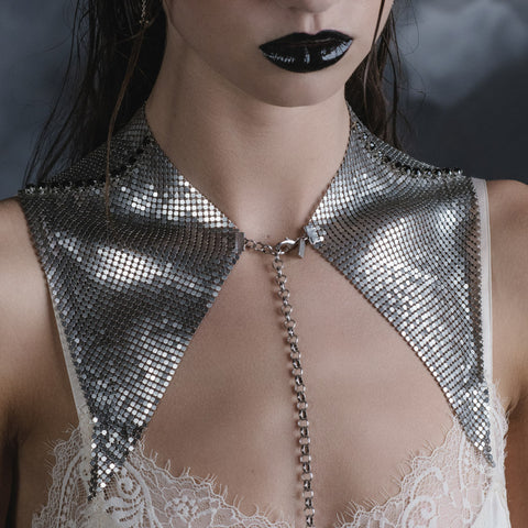 Close-up of silver chainmail gorget collar with pointed panels and front chain drop