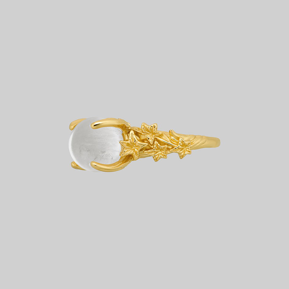 Gold crystal ball ring with ivy band, side view