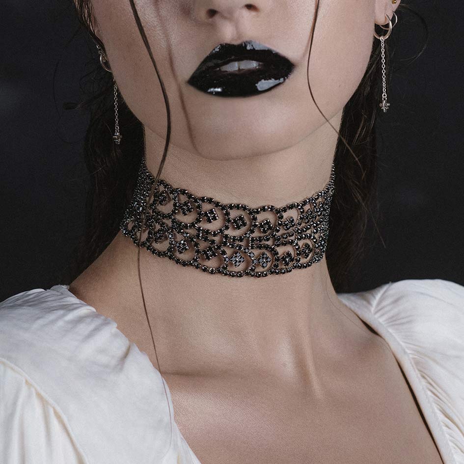 Model wearing Brenna black and silver dazzle chain choker