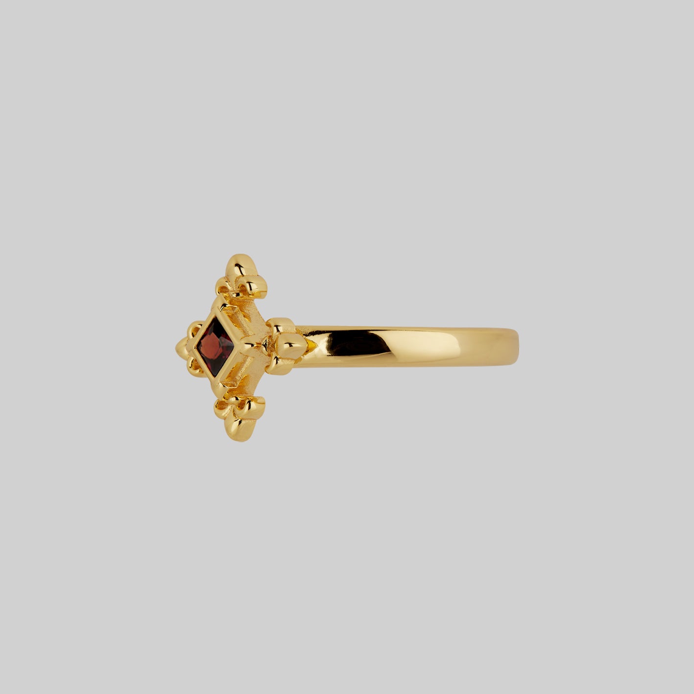 gold medieval fleur-de-lis garnet ring