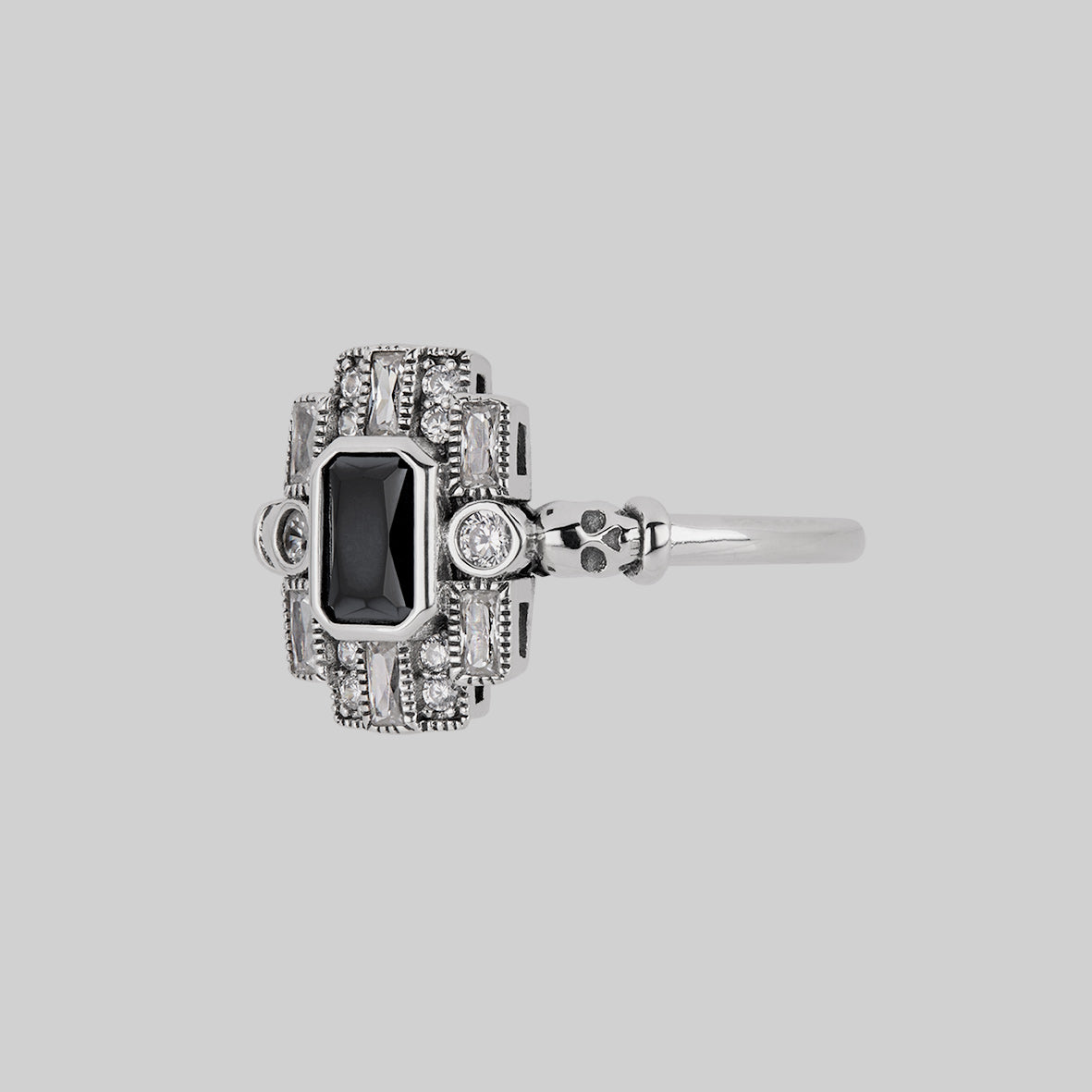 silver cocktail ring black spinel gemstone detailed skulls