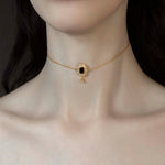 gold choker black spinel gemstone skull
