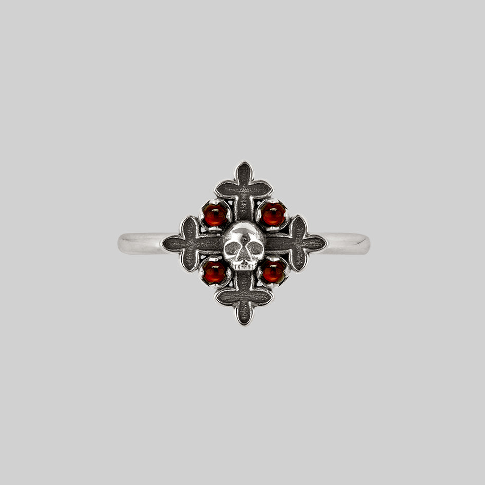 gothic inspired garnet cross ring