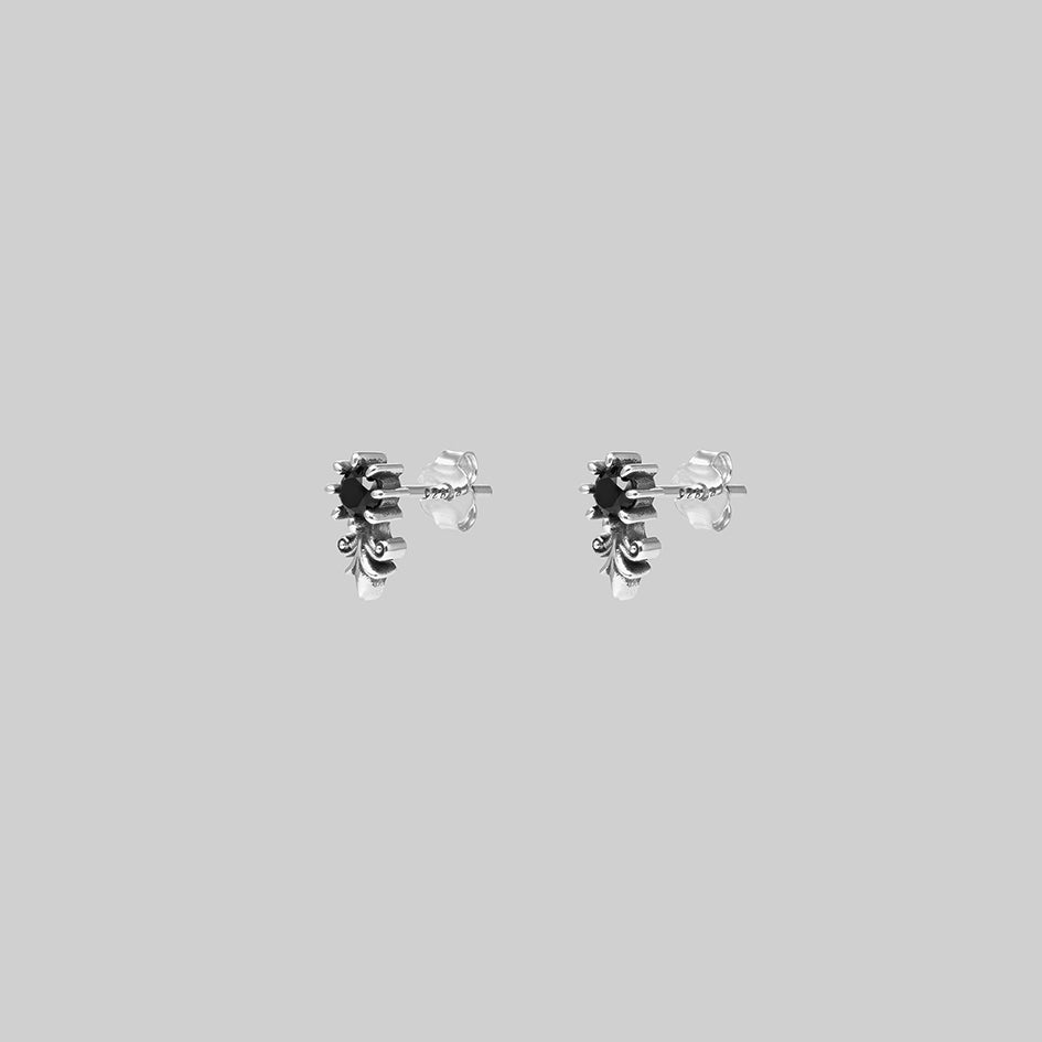 Fiora silver heraldic lily black onyx stud earrings, side view