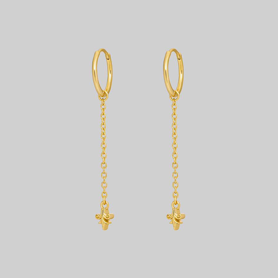 Fiora gold heraldic lily drop hoop earrings pair, side view
