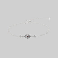 Silver dainty bracelet with garnet gemstone in a decorative 20s style