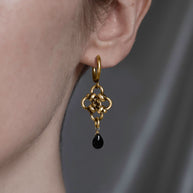 Gold knotted hoop earrings with black agate 