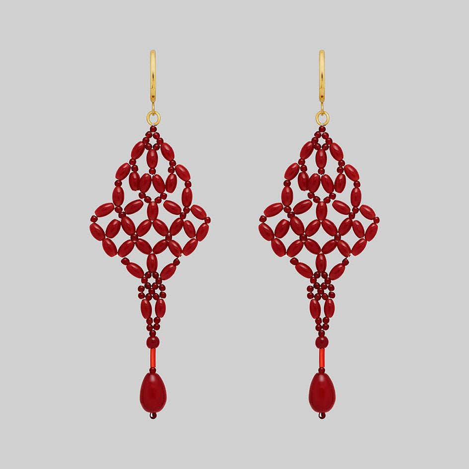 Red beaded chandelier drop earrings with gold hoops, pair