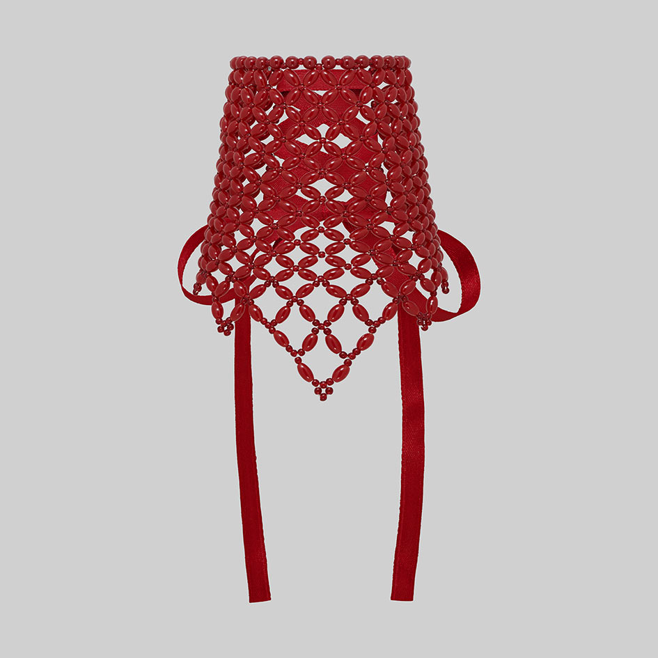 Single red beaded corset cuff, front view