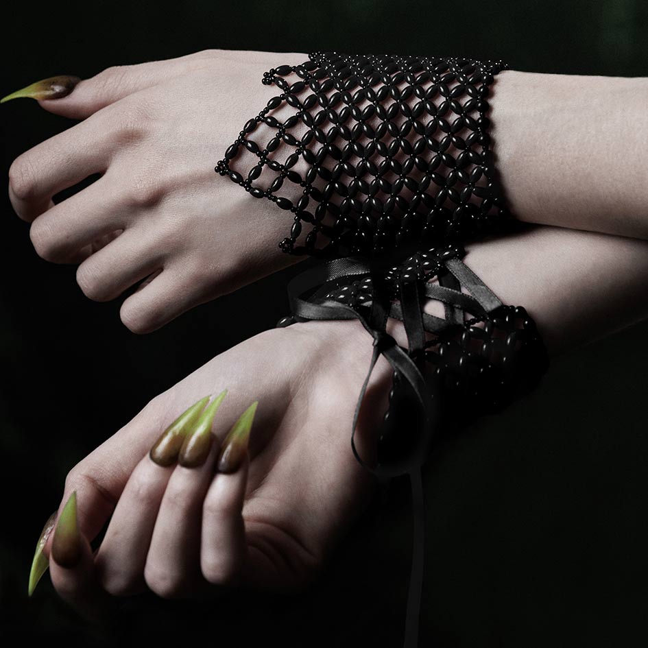Black glass beaded cuffs, black ribbon ties