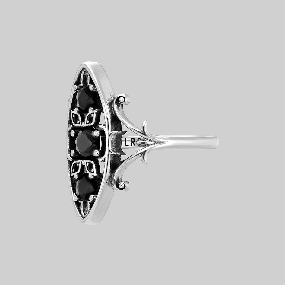 Heloise silver heraldic lily black onyx ring, side view
