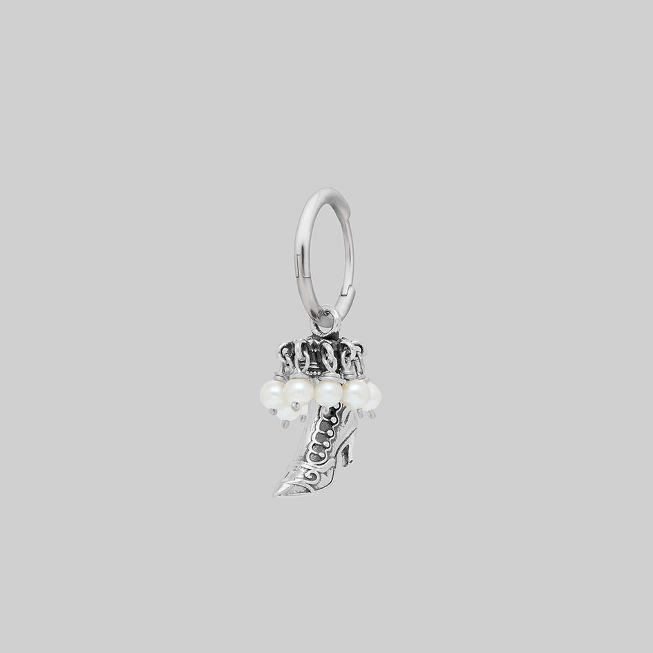 Single silver witches boot pearl hoop earring, side view