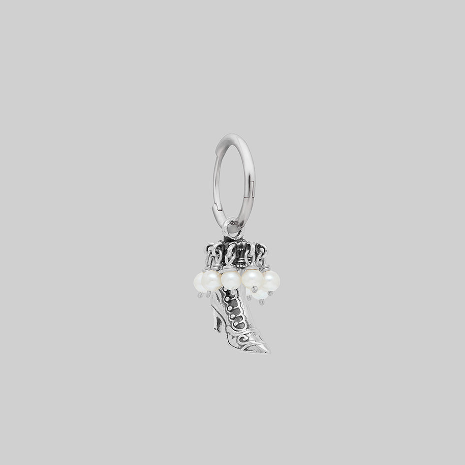 Single silver witches boot pearl hoop earring, side view