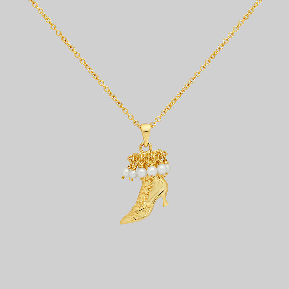 Gold witches boot pendant necklace with pearl drops