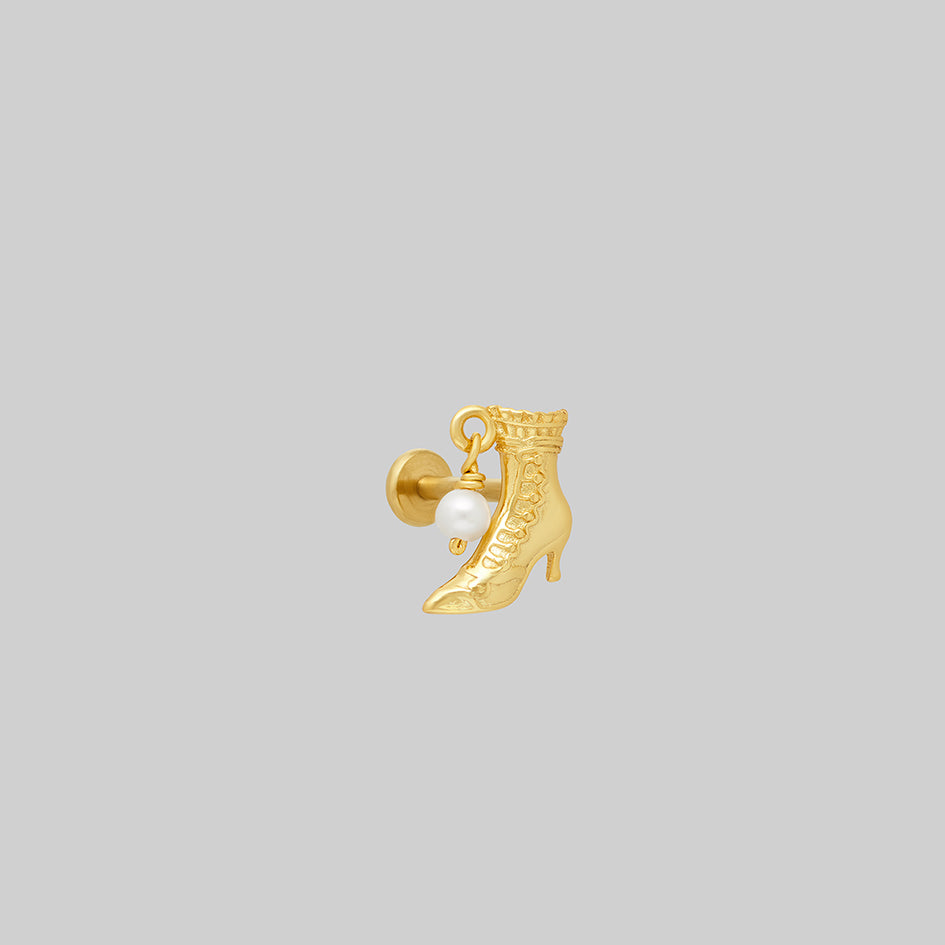 Gold witches boot stud earring, showing flat back post