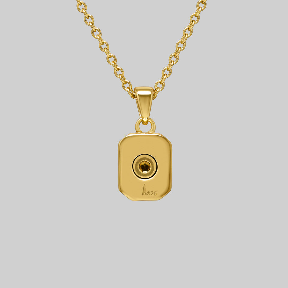 Back of the gold Clear Quartz cremation pendant with a screw fastened ashes chamber and 925 stamp