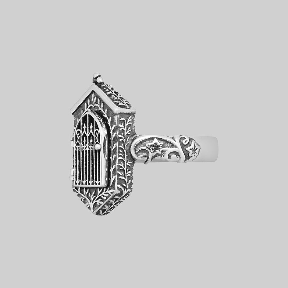 Silver iron gate ring, angled side view